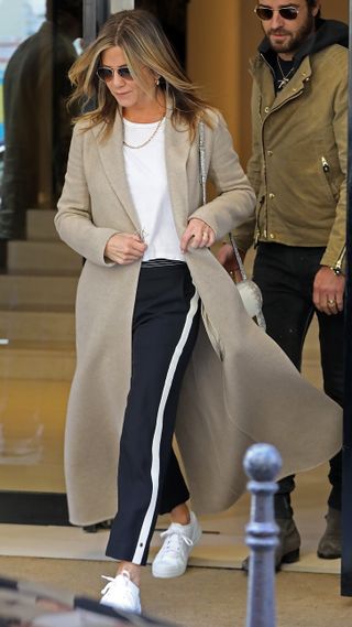 Jennifer Aniston walks out of a Chanel store in Paris in 2017