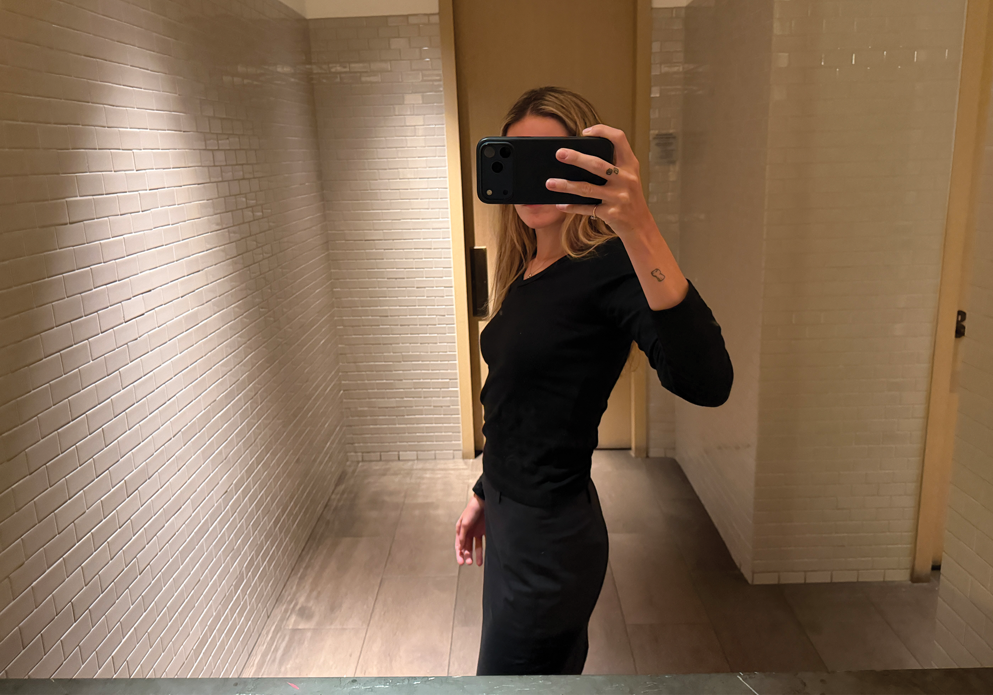 Eliza Huber in the bathroom at the The Terrace and Outdoor Gardens at the Times Square Edition.