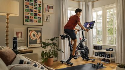 Man riding the Peloton Bike