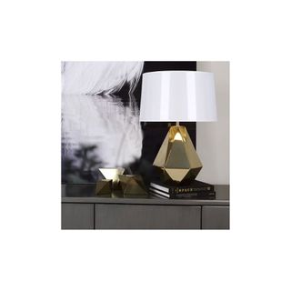 gold table lamp with white shade