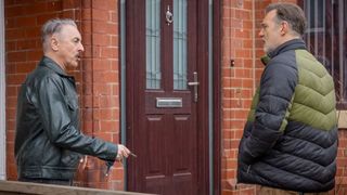 Leo and Clive stand on Leo's doorstep arguing