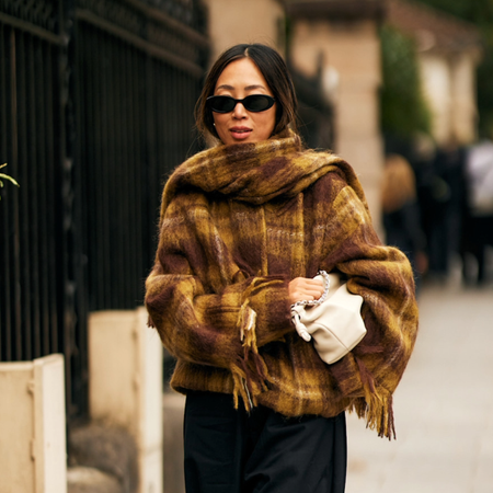 woman wearing a plaid cashmere sweater in New york 