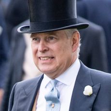 Ex-Prince Andrew, the former Duke of York, makes a grimacing face while wearing a top hat on day five of Royal Ascot at Ascot Racecourse on June 22, 2019