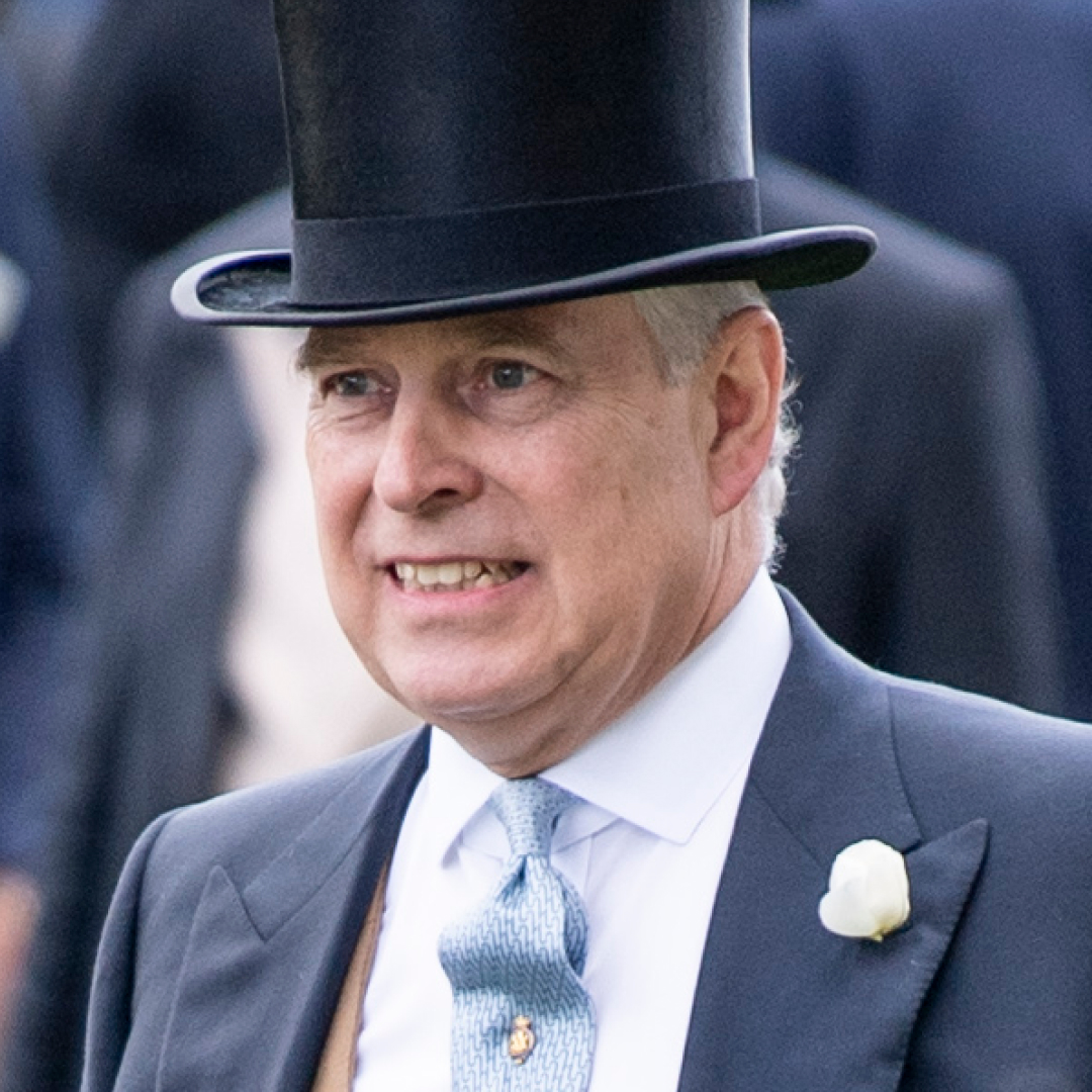 Ex-Prince Andrew, the former Duke of York, makes a grimacing face while wearing a top hat on day five of Royal Ascot at Ascot Racecourse on June 22, 2019