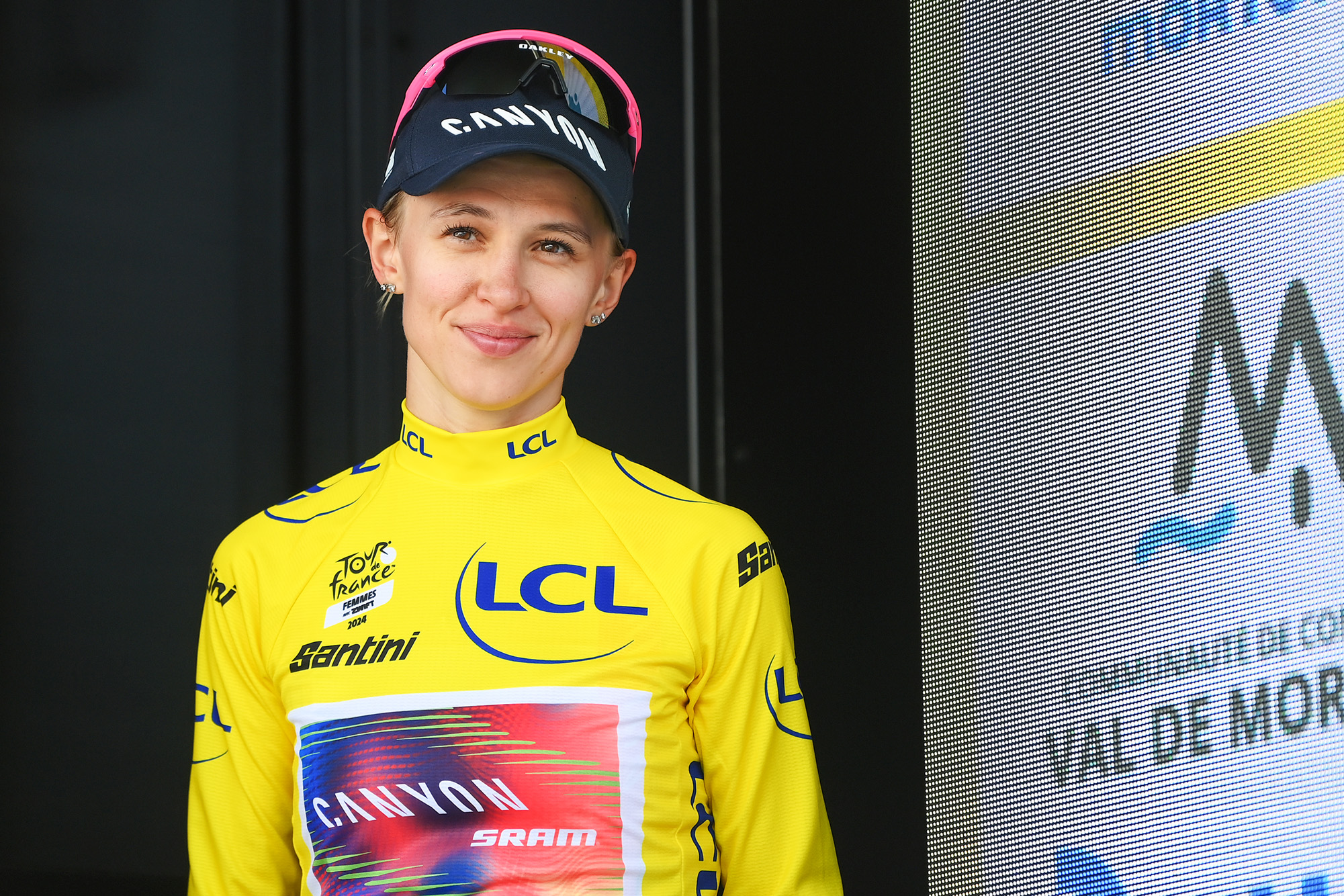MORTEAU, FRANCE - AUGUST 16: Katarzyna Niewiadoma of Poland and Team Canyon//SRAM Racing celebrates at podium as Yellow leader jersey winner during the 3rd Tour de France Femmes 2024, Stage 6 a 159.2km stage from Remiremont to Morteau / #UCIWWT / on August 16, 2024 in Morteau, France. (Photo by Alex Broadway/Getty Images)