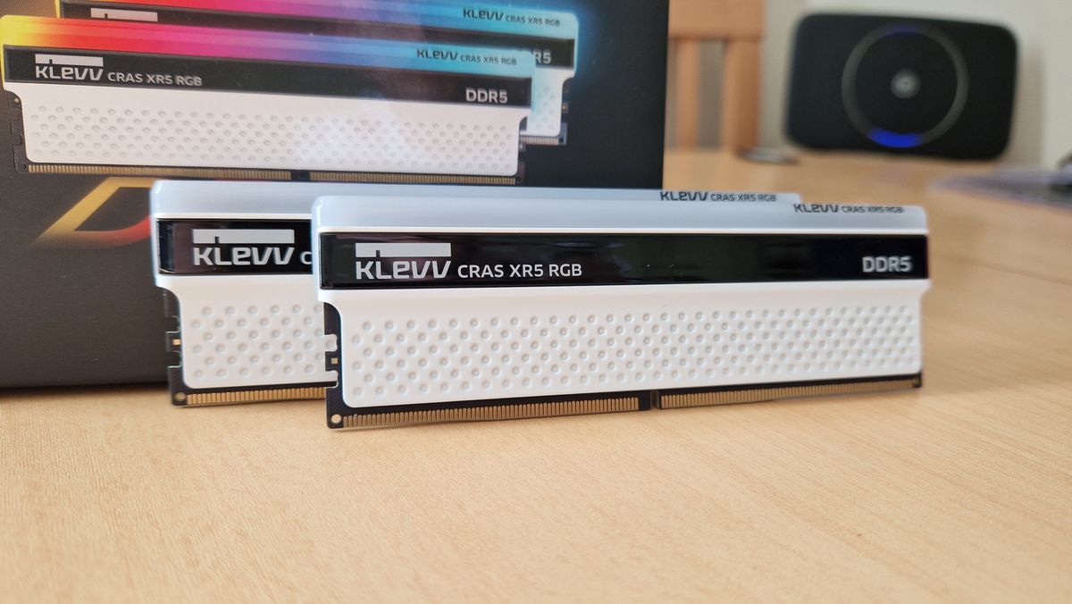 Klevv Cras XR5 RGB DDR5 RAM standing upright next to its packaging