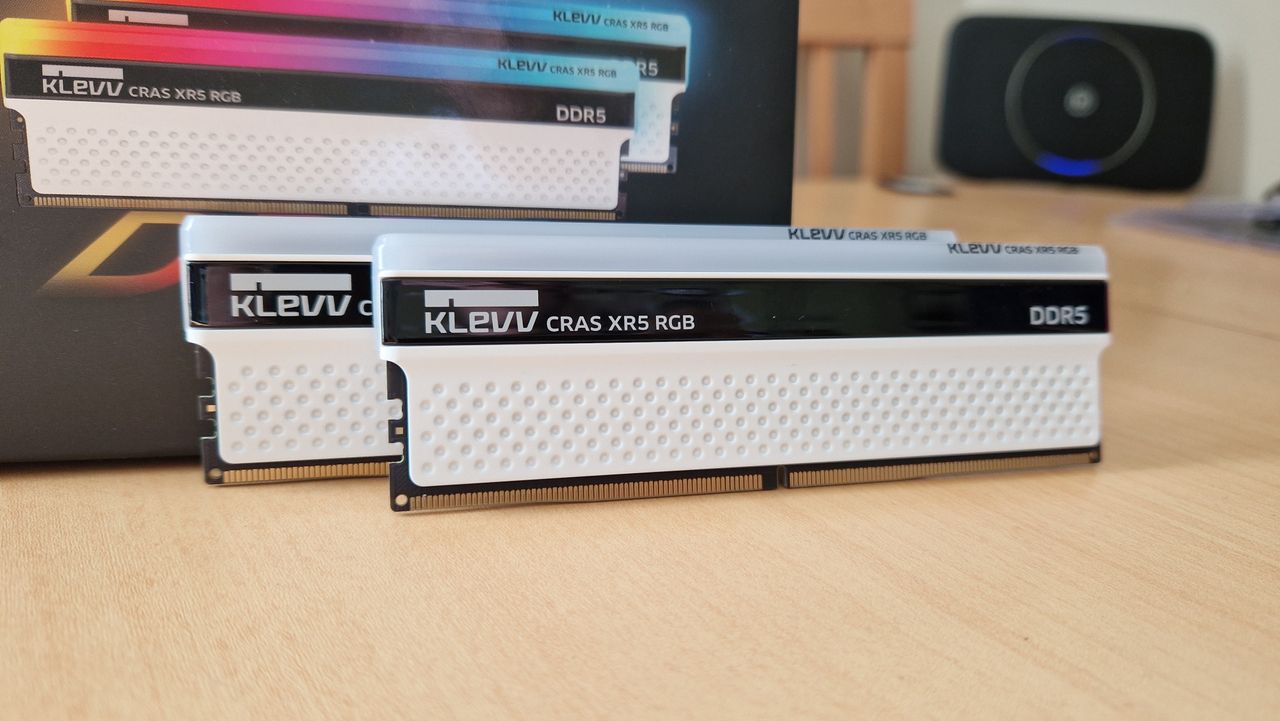 Klevv Cras XR5 RGB DDR5 RAM standing upright next to its packaging