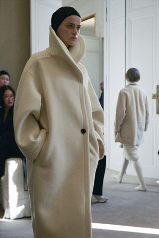 a model walks The Row winter 2025 runway during Paris Fashion Week