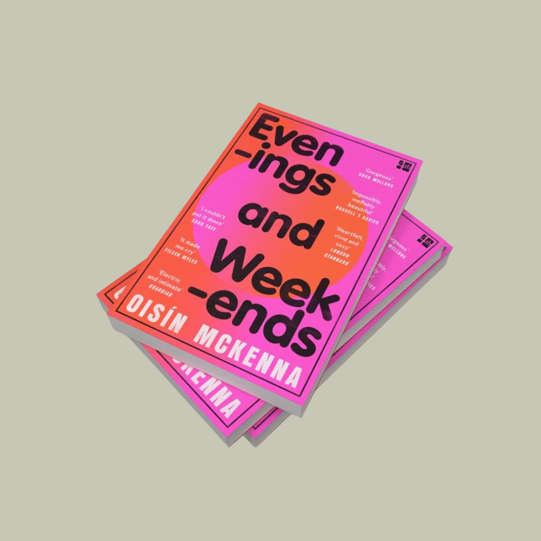 Evenings and Weekends book with bright pink and red cover, black titling in a rounded font, and name of the author spelled in white, sits against a pale green background.