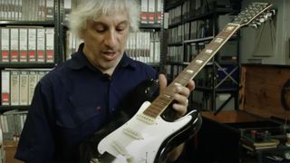 Lee Ranaldo holds the Sonic Sixsteen guitar that Steve Albini built for Sonic Youth