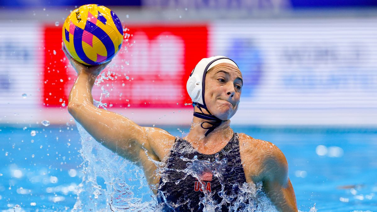 Maggie Steffens of Team USA throws the ball in a water polo match ahead of the 2024 Paris Olympic Games.