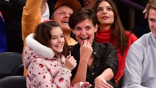 new york, ny december 16 suri cruise and katie holmes attend the oklahoma city thunder vs new york knicks game at madison square garden on december 16, 2017 in new york city photo by james devaneygetty images