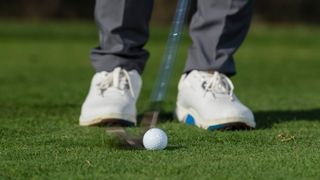 PGA pro Dan Grieve hitting a chip shot at Infinitum Golf Resort in Spain