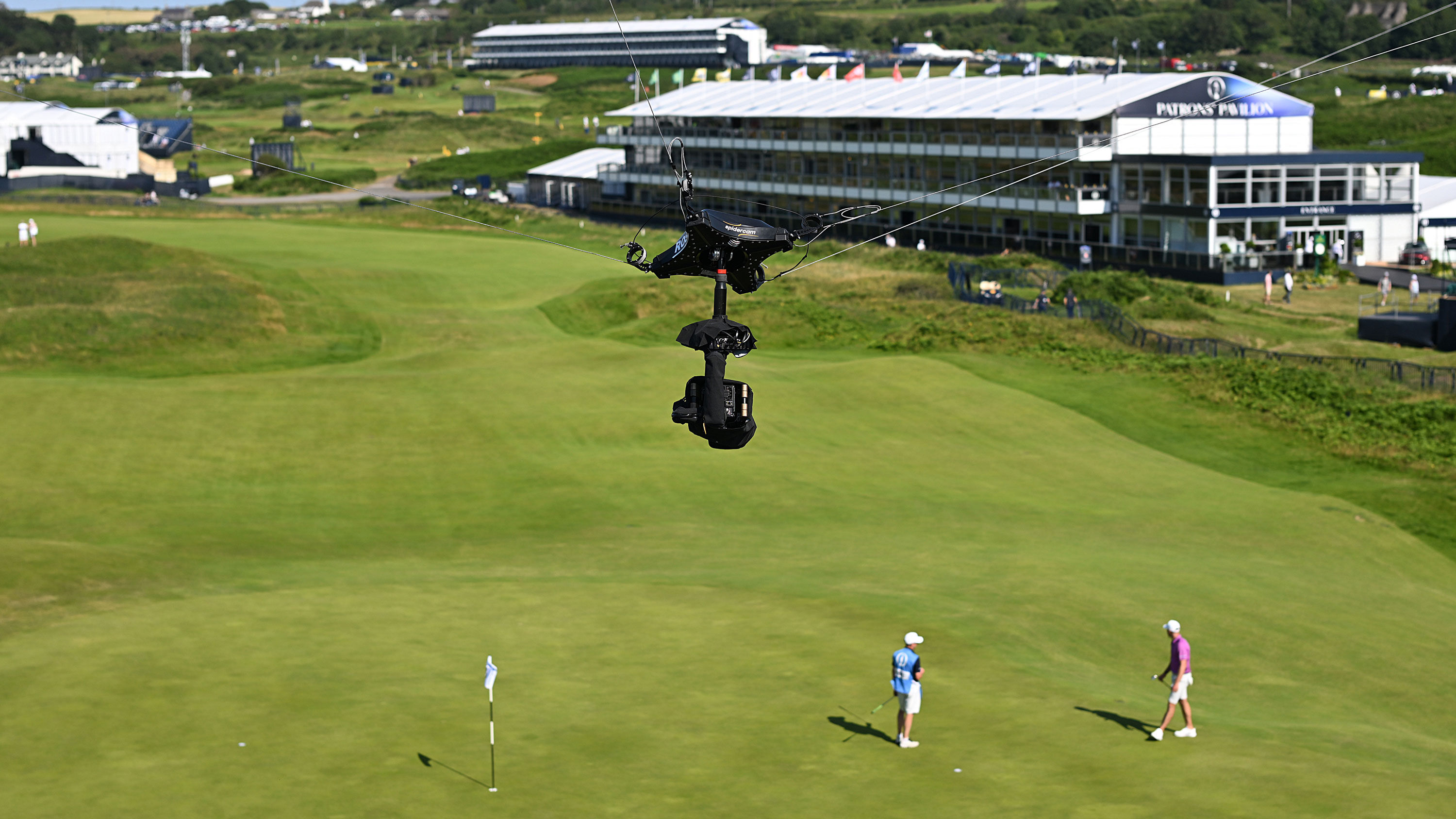 spidercam suspended above a green at the open championship at royal portrush