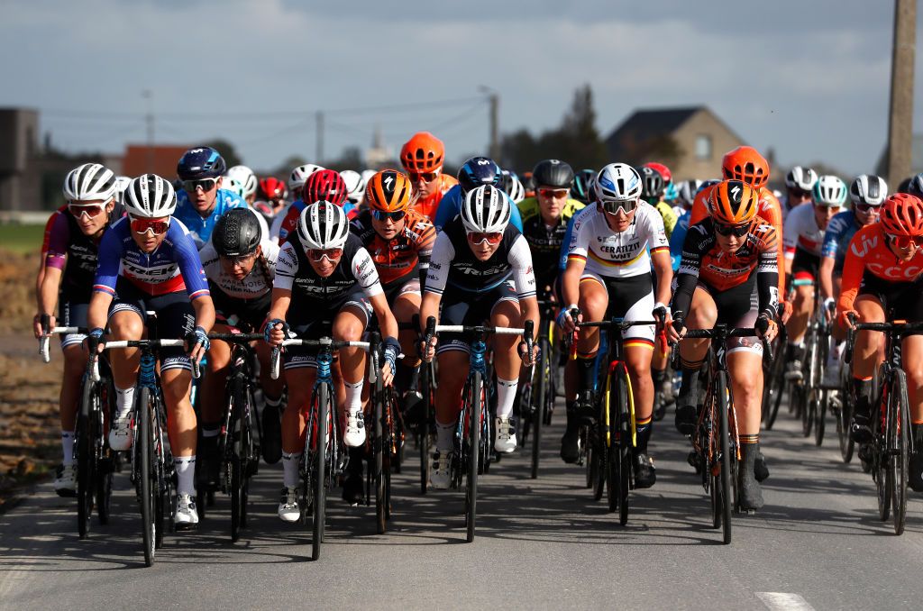 WEVELGEM BELGIUM OCTOBER 11 Elisabeth DeignanArmitstead of The United Kingdom and Team Trek Segafredo Audrey CordonRagot of France and Team Trek Segafredo Anouska Koster of Netherlands and Team Parkhotel Valkenburg Trixi Worrack of Germany and Team Trek Segafredo Amalie Dideriksen of Denmark and Boels Dolmans Cycling Team Elisa Longo Borghini of Italy and Team Trek Segafredo Lisa Brennauer of Germany and Ceratizit WNT Pro Cycling Team Amy Pieters of The Netherlands and Boels Dolmans Cycling Team Peloton during the 9th GentWevelgem In Flanders Fields 2020 Women Elite a 1414km race from Ieper to Wevelgem GentWevelgem FlandersClassic on October 11 2020 in Wevelgem Belgium Photo by Bas CzerwinskiGetty Images