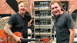 Brian Setzer (right) and guitar tech Tyler Sweet