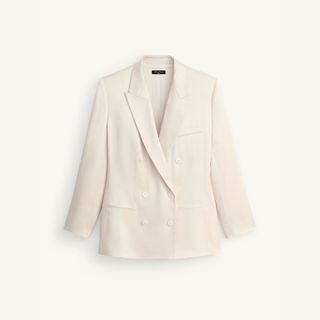 flat lay image of white blazer