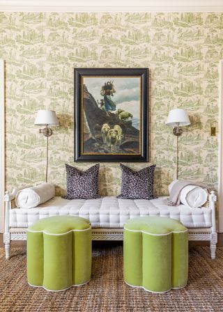 A retro style living room with with daybed alongside velvet footstools and velvet animal print cushions