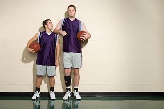 Short and tall basketball players, side by side.