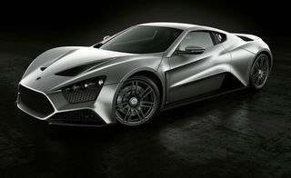 Zenvo Car, Denmark. A silver sports car on a black floor.