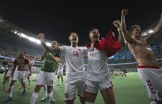 Danish players celebrate their win over the Czech Republic at Euro 2020