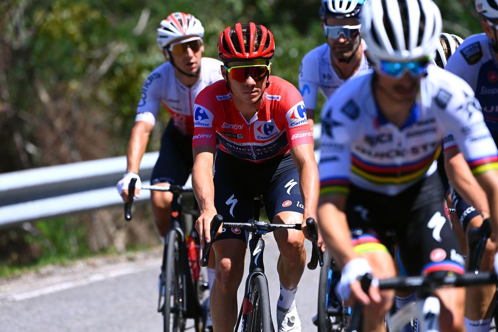 LES PRAERESNAVA SPAIN AUGUST 28 Remco Evenepoel of Belgium and Team QuickStep Alpha Vinyl Red Leader Jersey competes during the 77th Tour of Spain 2022 Stage 9 a 1714km stage from Villaviciosa to Les Praeres Nava 743m LaVuelta22 WorldTour on August 28 2022 in Les Praeres Nava Spain Photo by Tim de WaeleGetty Images