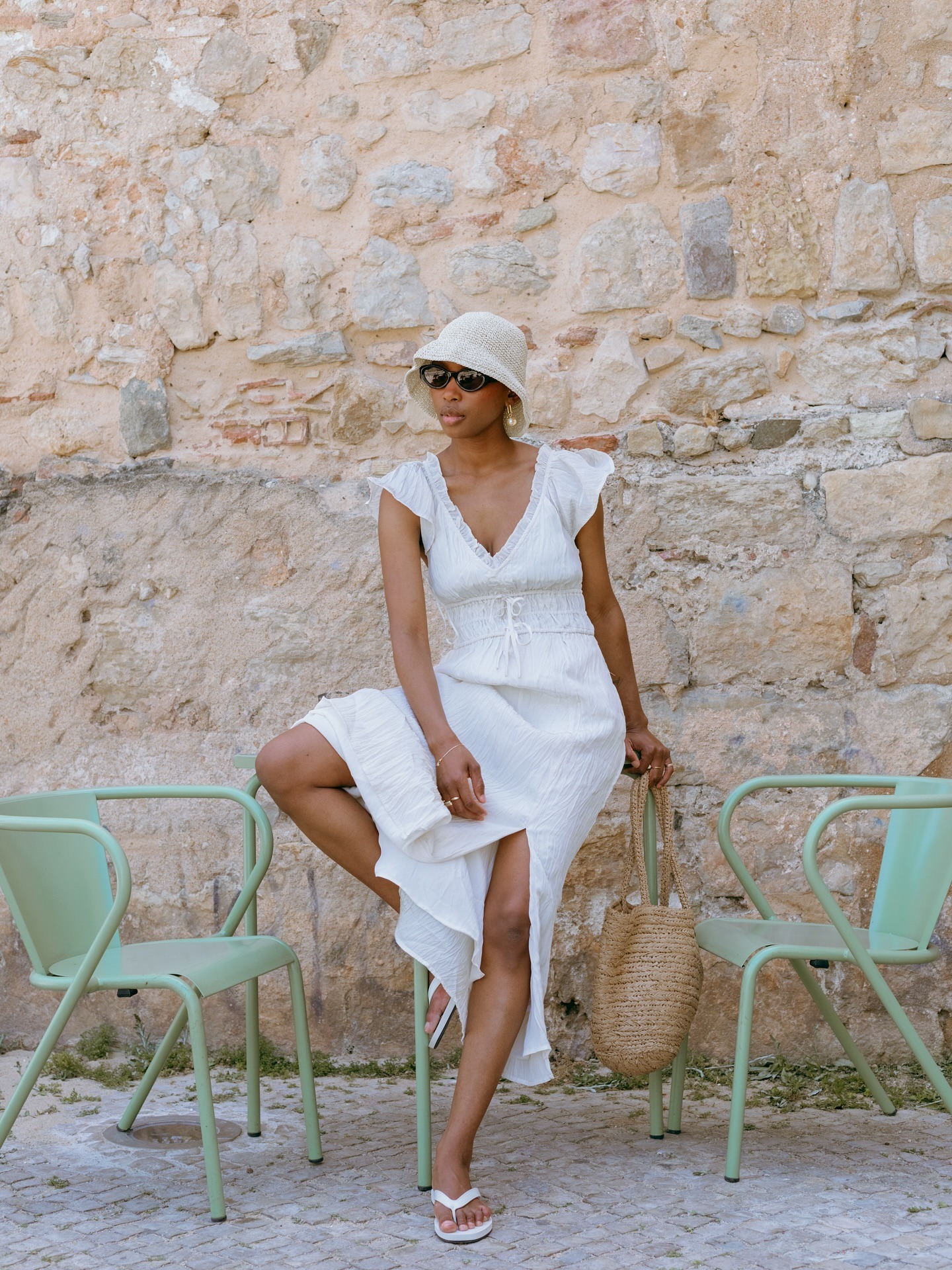 Influencer wearing white nightgown dress.