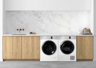 A heat pump washer and dryer in a utility room