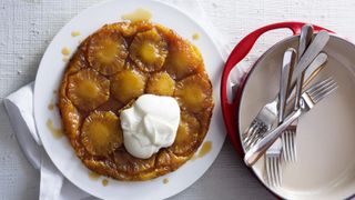 Le Creuset Tarte Tatin Tin next to an apple tarte tatin