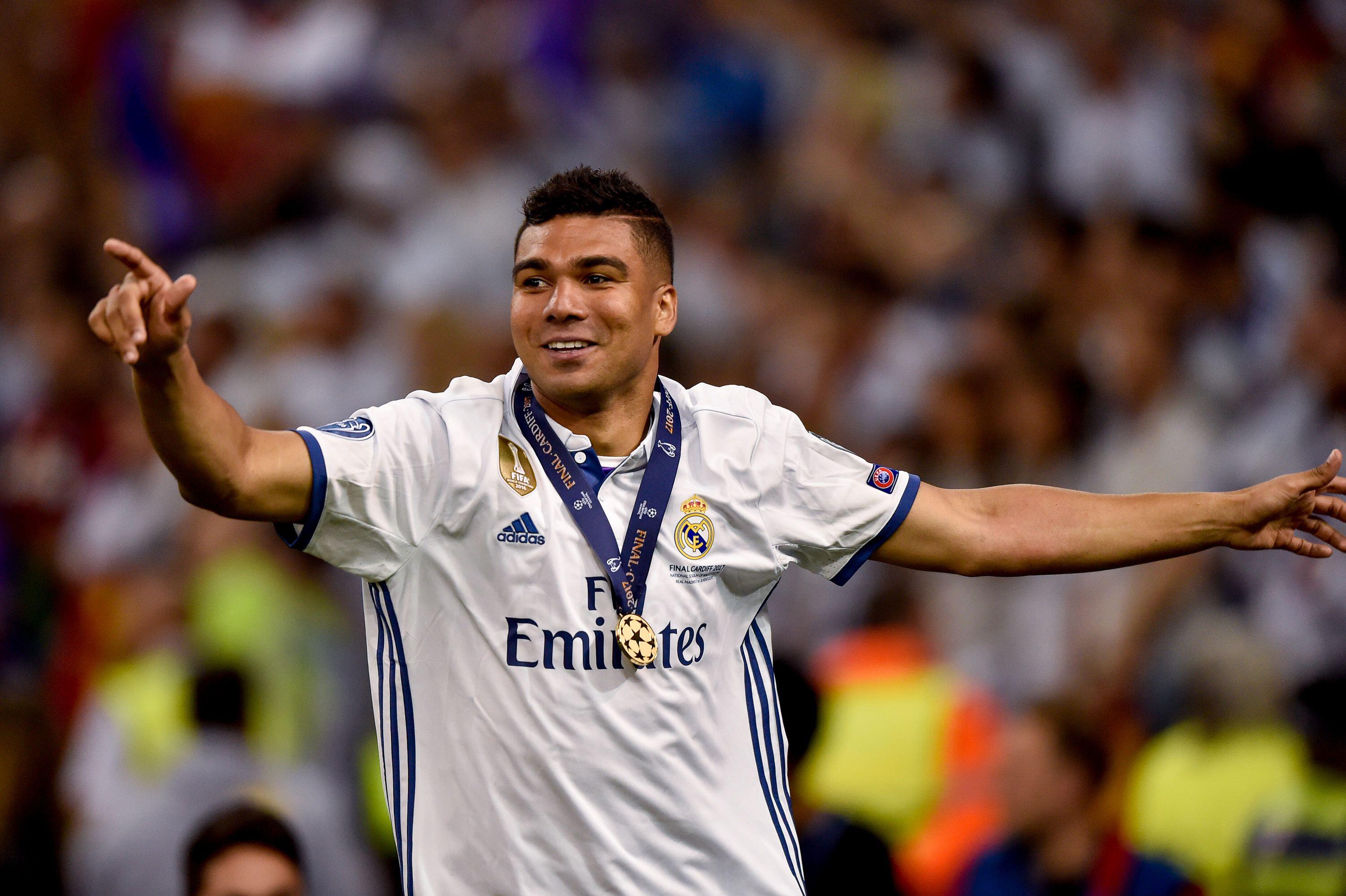 Casemiro celebrates with his winner's medal after Real Madrid's victory in the 2017 Champions League final against Juventus