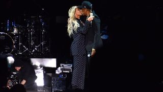 Beyoncé and Jay-Z kissing onstage