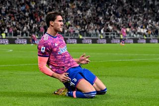 Dusan Vlahovic of Juventus celebrates after scoring his team's second goal during the Serie A match between Juventus and Bologna FC at Allianz Stadium on October 02, 2022 in Turin, Italy.