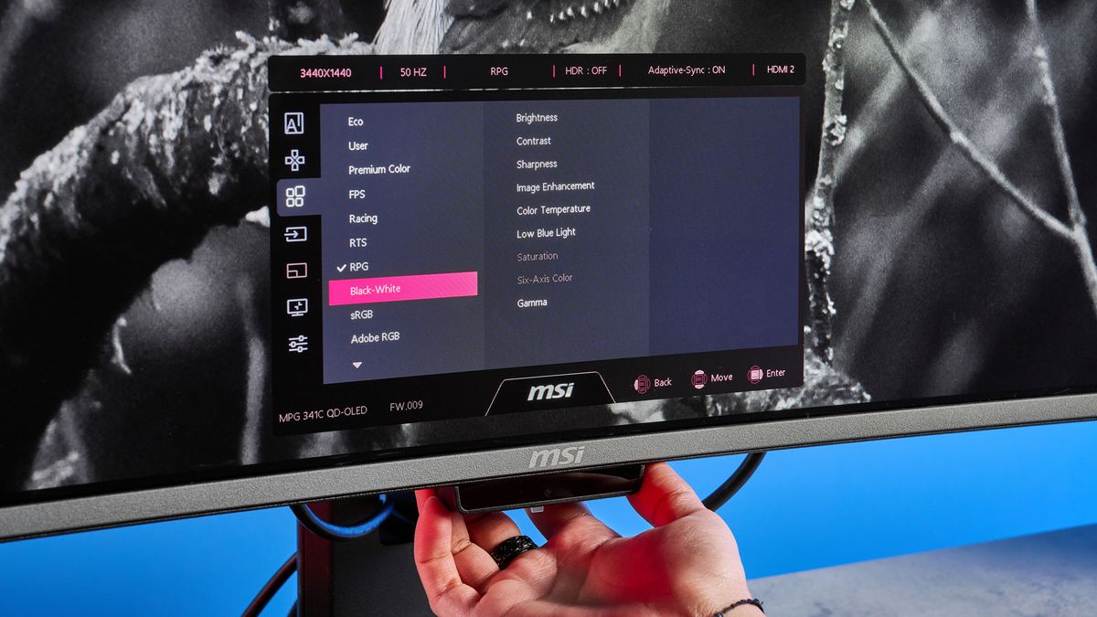 An MSI MPG 341CQR QD-OLED X36 gaming monitor in black