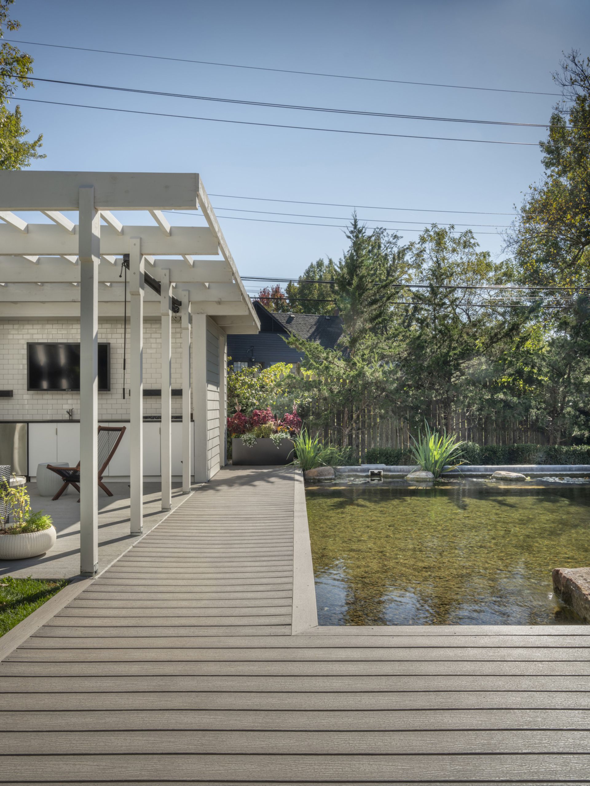 A natural swimming pool with decking