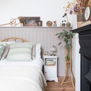 neutral bedroom with vintage pieces and tongue and groove