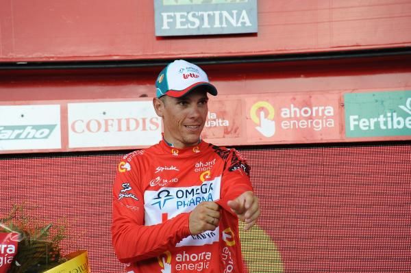 Philippe Gilbert (Omega Pharma-Lotto) pulls on the red jersey