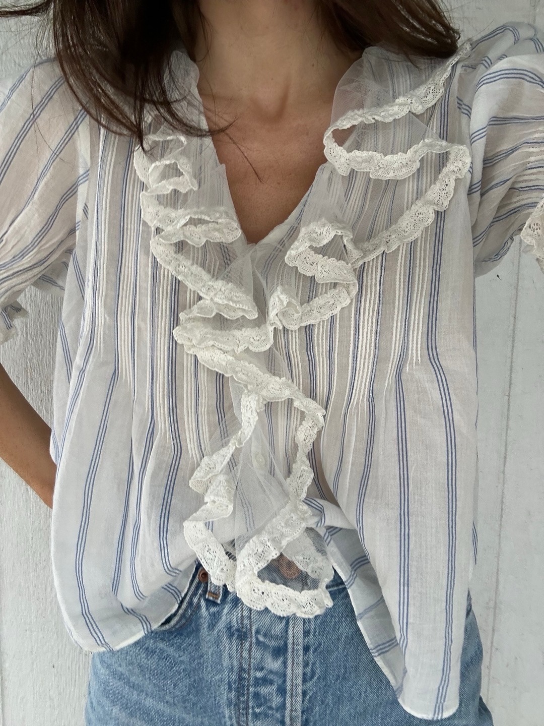 Cam wearing a Doen blouse.