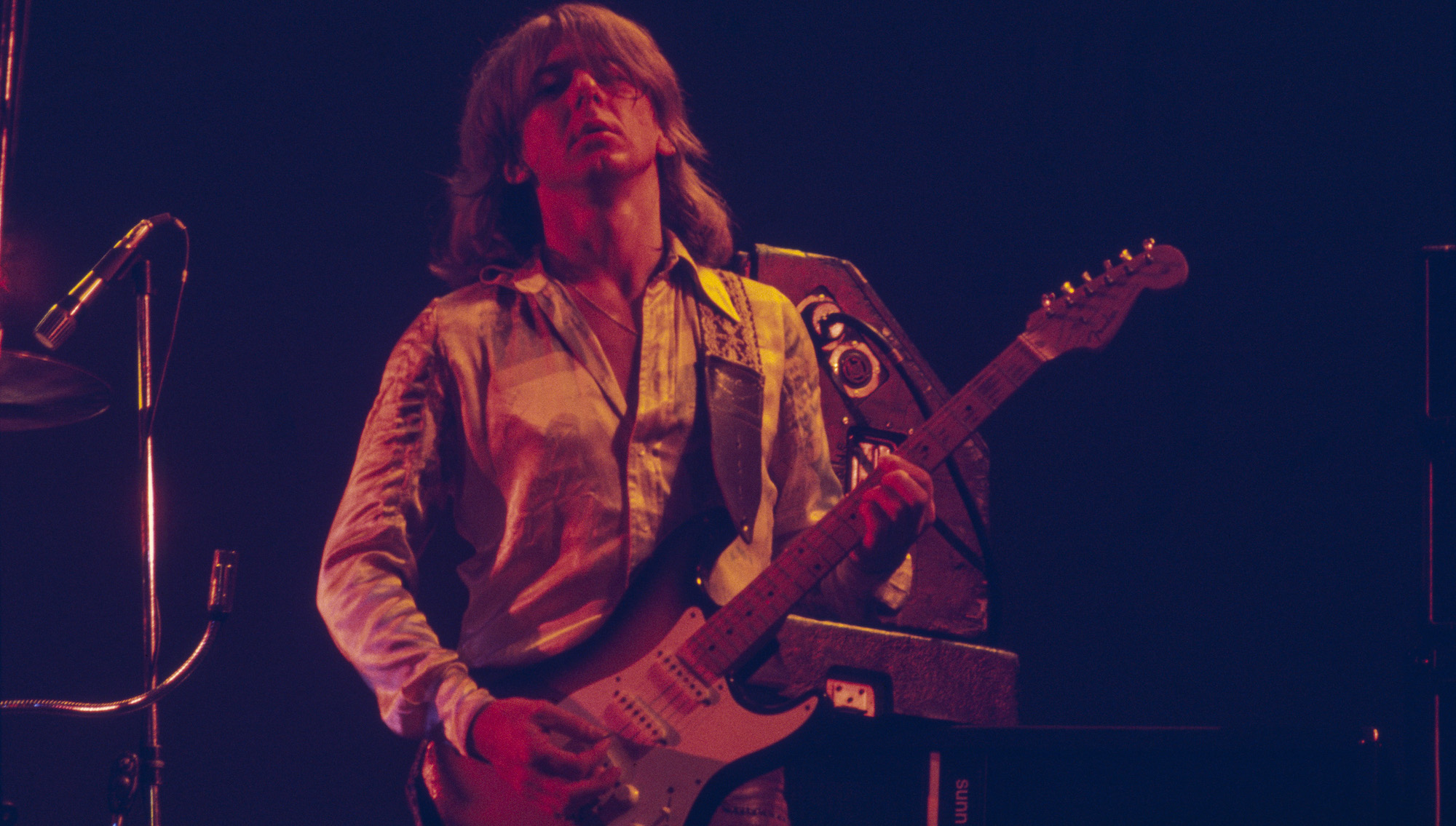 Mick Ralphs performs onstage with Bad Company at Earl&#039;s Court in London in July 1977