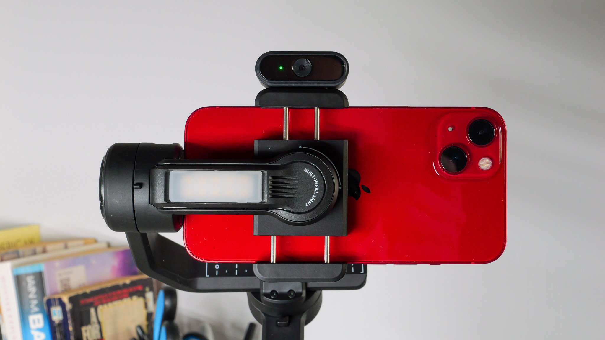 Zhiyun Smooth 5S AI smartphone stabilizer with phone in grip and AI tracker module mounted