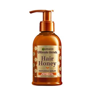 Product shot of Garnier Ultimate Blends Hair Honey Repairing Serum, one of the Marie Claire UK Hair Awards 2024 winners 