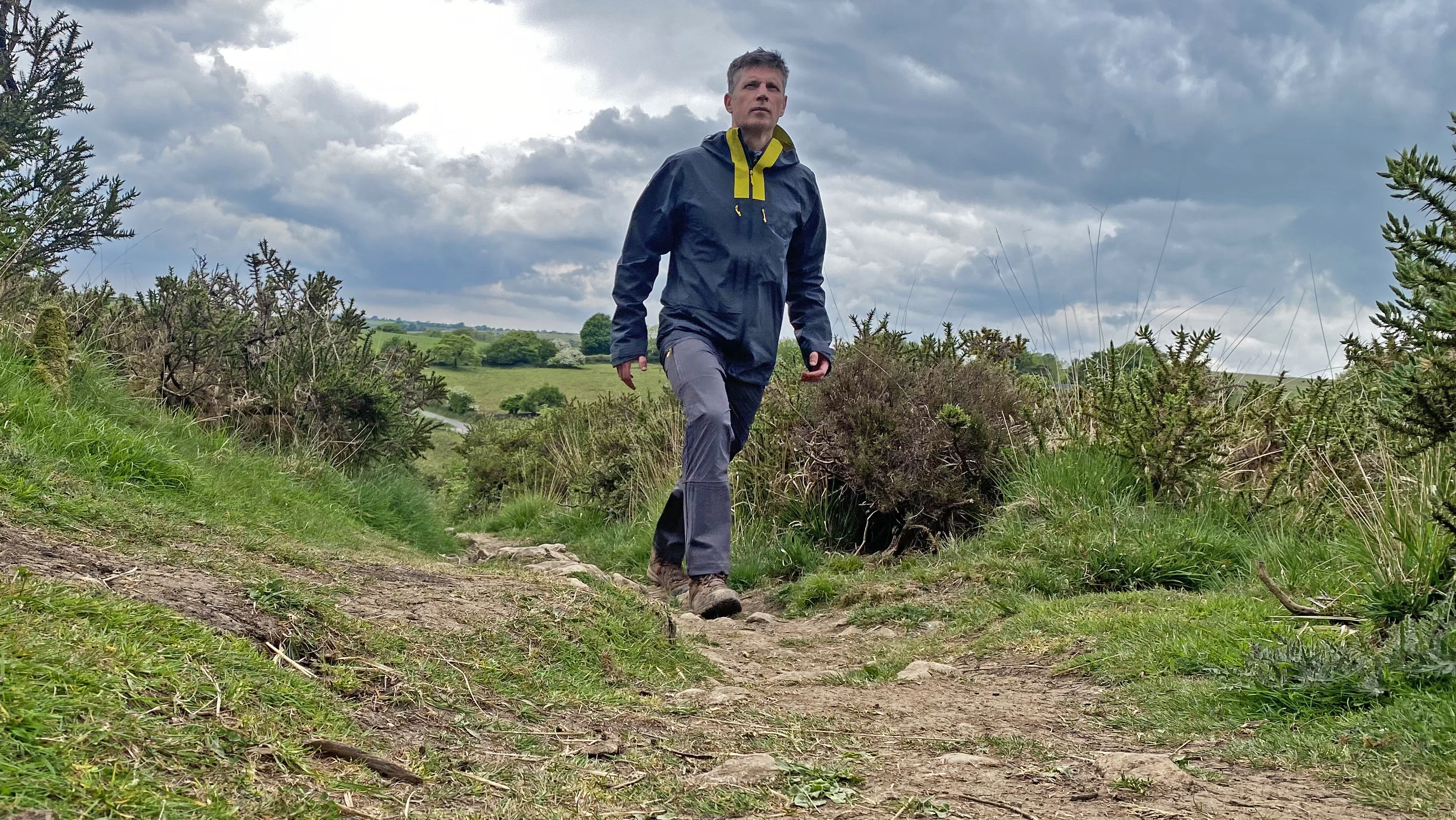 Hiker wearing the Haglöfs L.I.M ZT II GTX in the Mendips Hills
