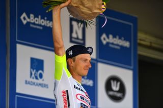 DURBUY BELGIUM JUNE 18 Quinten Hermans of Belgium and Team Intermarch Wanty Gobert Matriaux celebrates at podium as stage winner during the 91st Baloise Belgium Tour 2022 Stage 4 a 1722km stage from Durbuy to Durbuy BaloiseBelgiumTour on June 18 2022 in Durbuy Belgium Photo by Luc ClaessenGetty Images