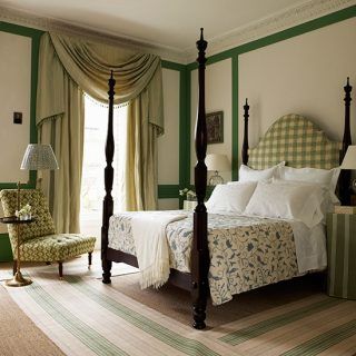 colonial style bedroom with four poster bed