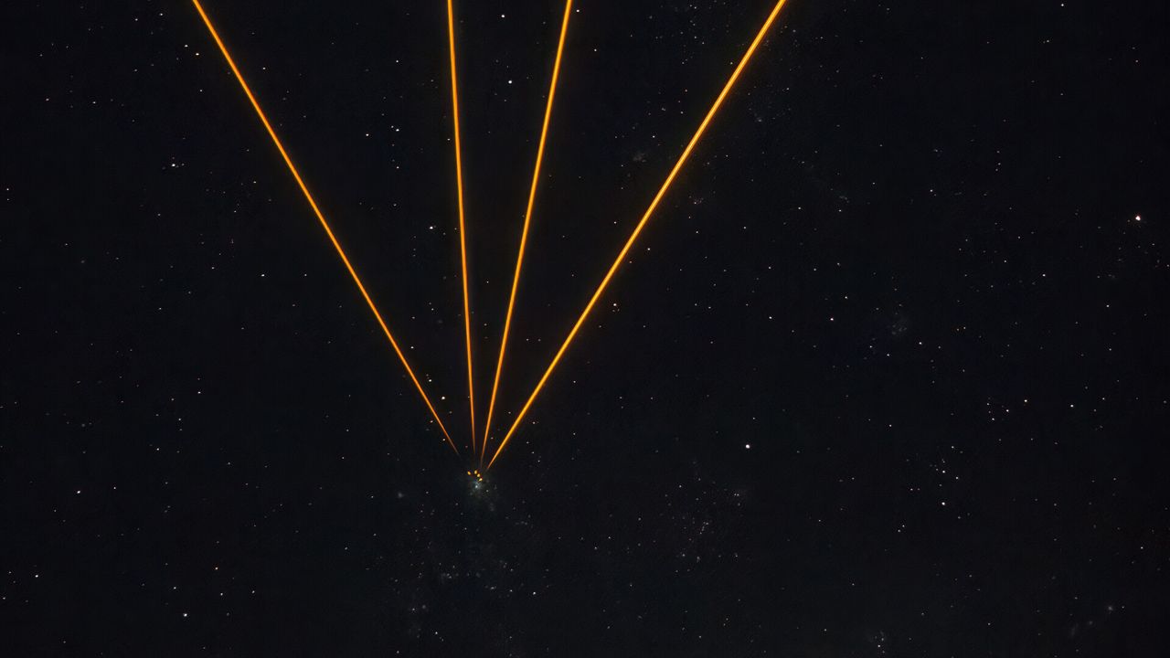 Lasers target the Tarantula Nebula with 'artificial stars' | Space photo of the day for Nov. 19, 2025