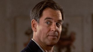 Close-up on Tony's wide-eyed face in NCIS: Tony & Ziva Season 1