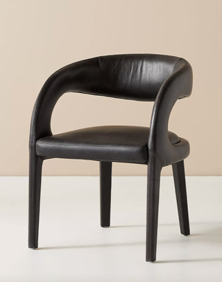 Black leather modern dining accent chair from Anthropologie.