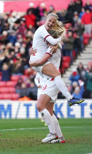England’s Ellen White (right) celebrates with Beth Mead after scoring against Austria