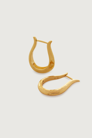 gold lyre-shaped hoops