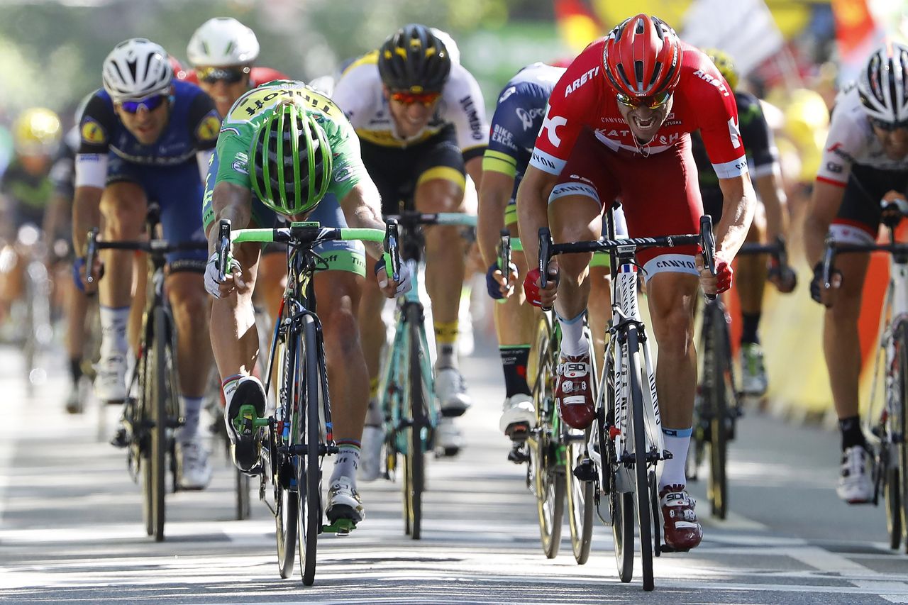 Peter Sagan (Tinkoff) takes the stage from Alexander Kristoff (Katusha)