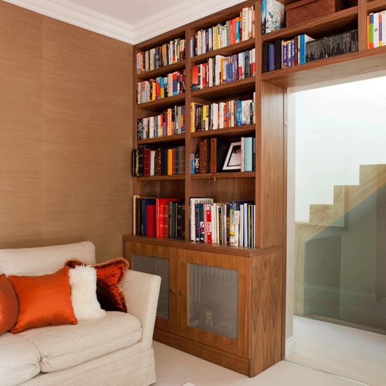 bookshelves with white sofa